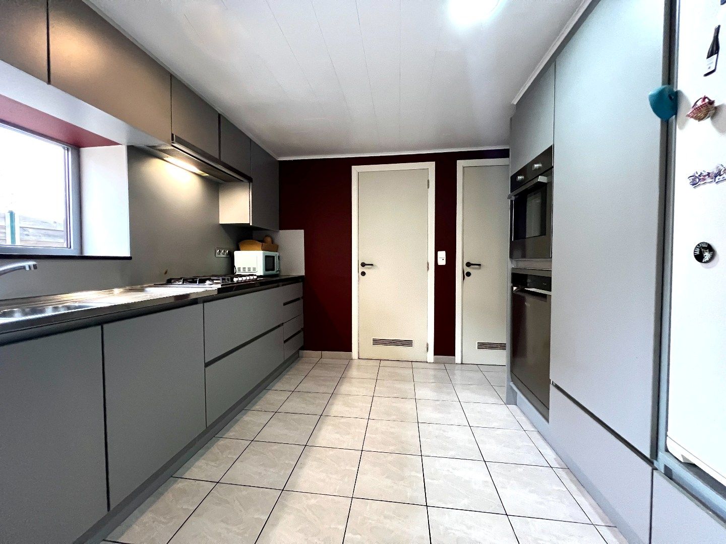 Charme troef in deze starterswoning te Wevelgem! foto 17