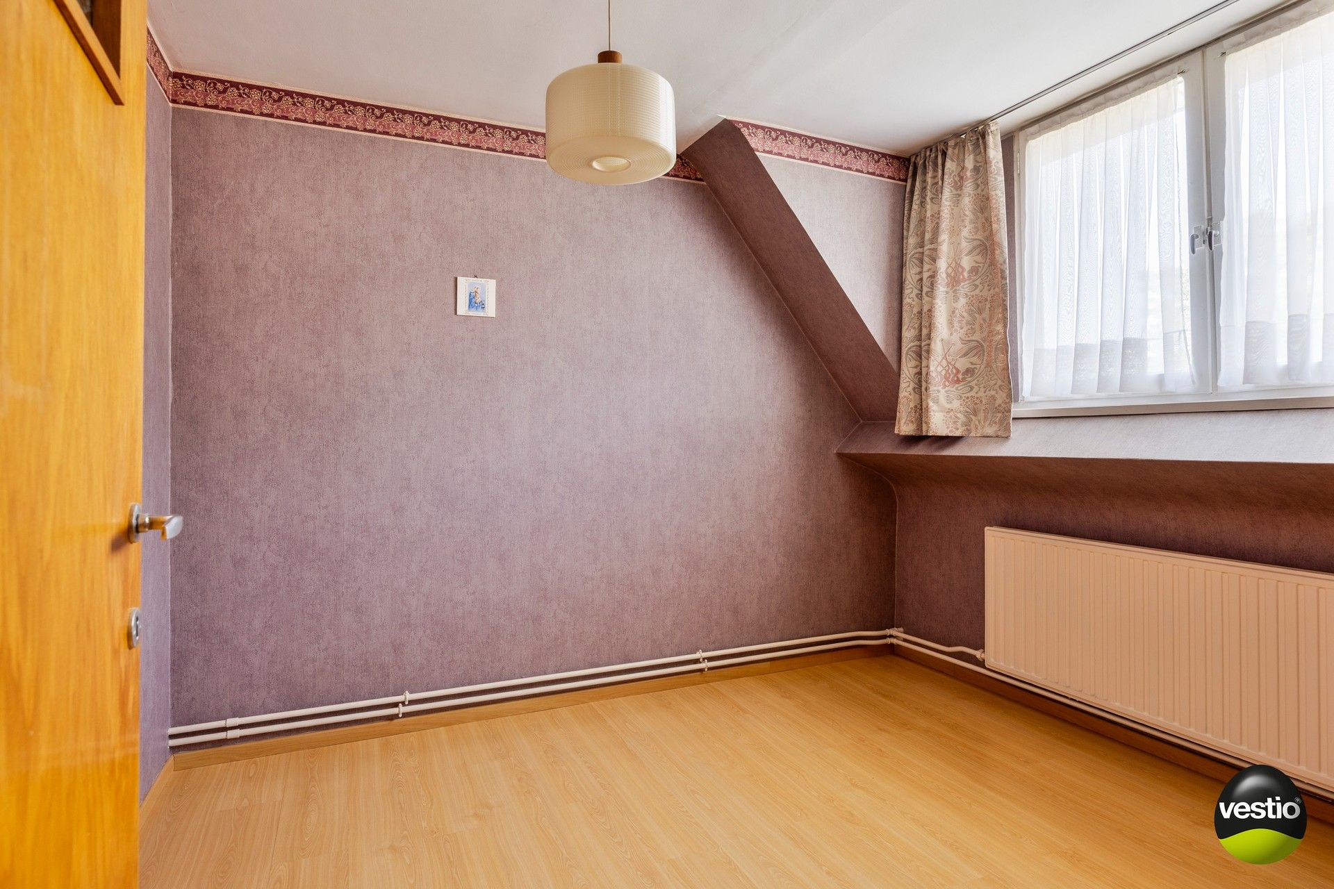 Charmante gezinswoning met drie slaapkamers op rustige, centrale ligging te Genk foto 13