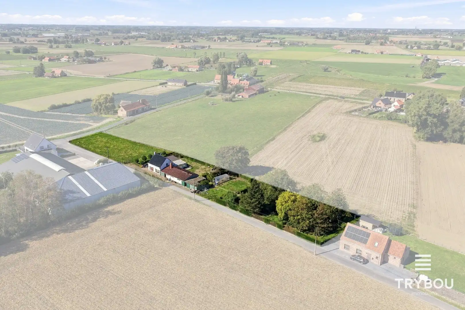 Landelijk gelegen woning met opslagplaats op 3687m² in Merkem! foto 2