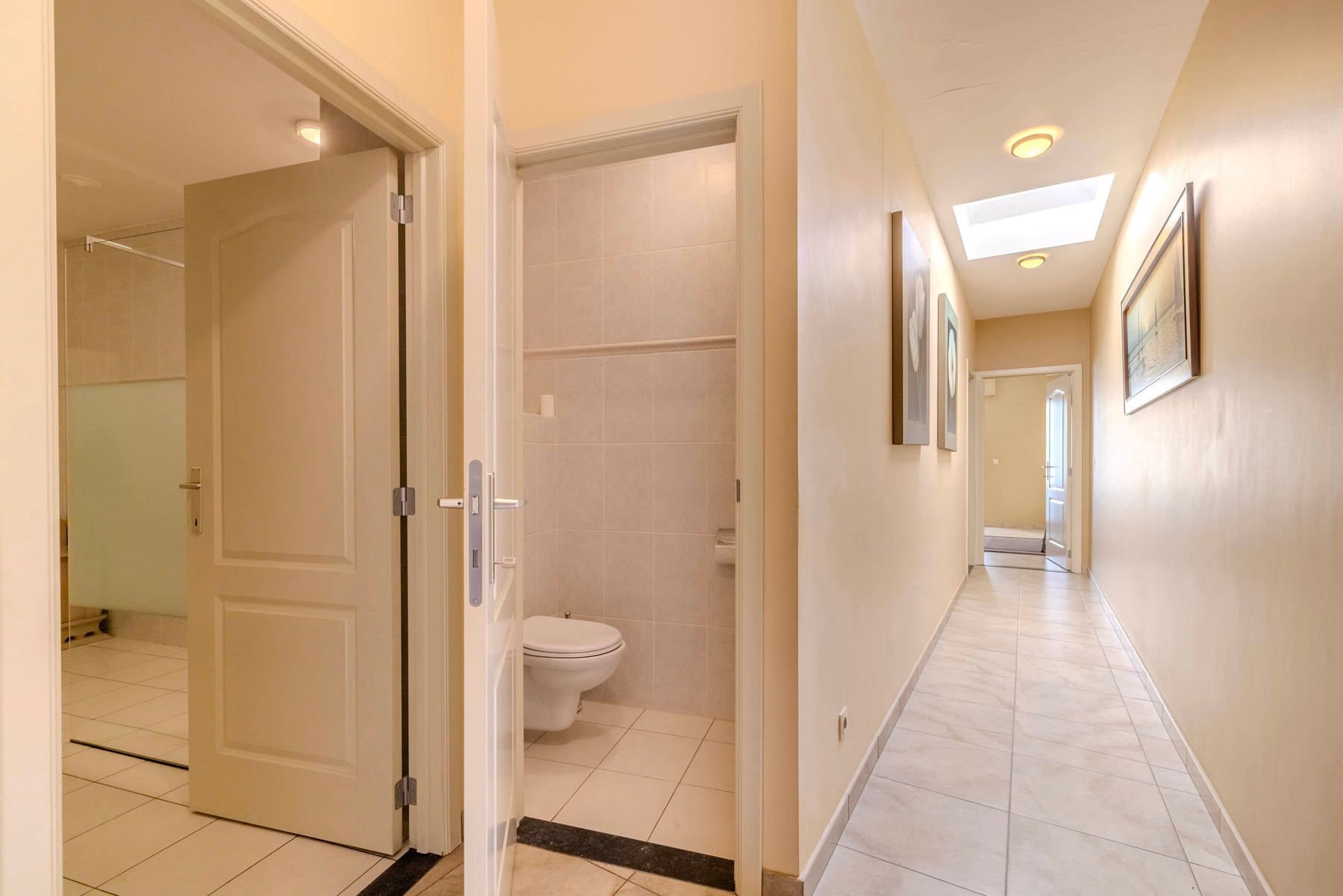 GLV app (132m²) met 2slpk, terras, garagebox en kelder foto 11