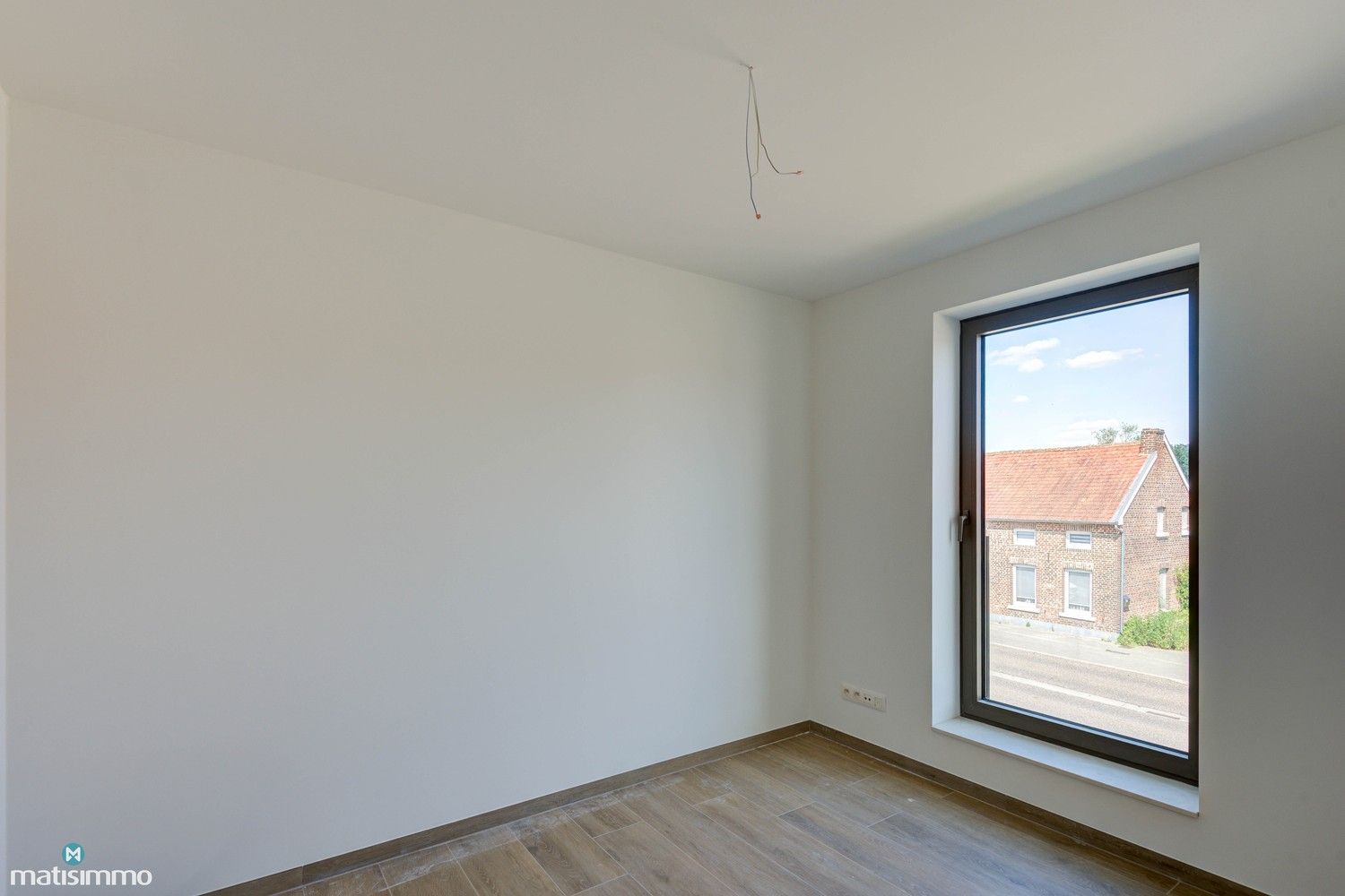 NIEUWBOUWAPPARTEMENT MET TWEE SLAAPKAMERS, RUIM TERRAS EN PARKEERPLAATS TE MUNSTERBILZEN foto 11