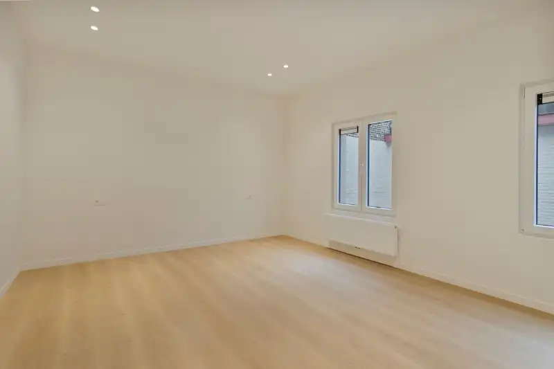 Verscholen achter een charmante groene gevel: prachtig gerenoveerde woning met 3 slaapkamers foto 11