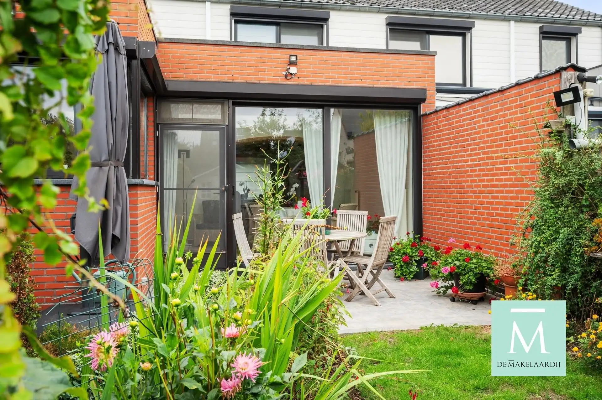 Volledig gerenoveerde woning met aangename tuin  foto 28