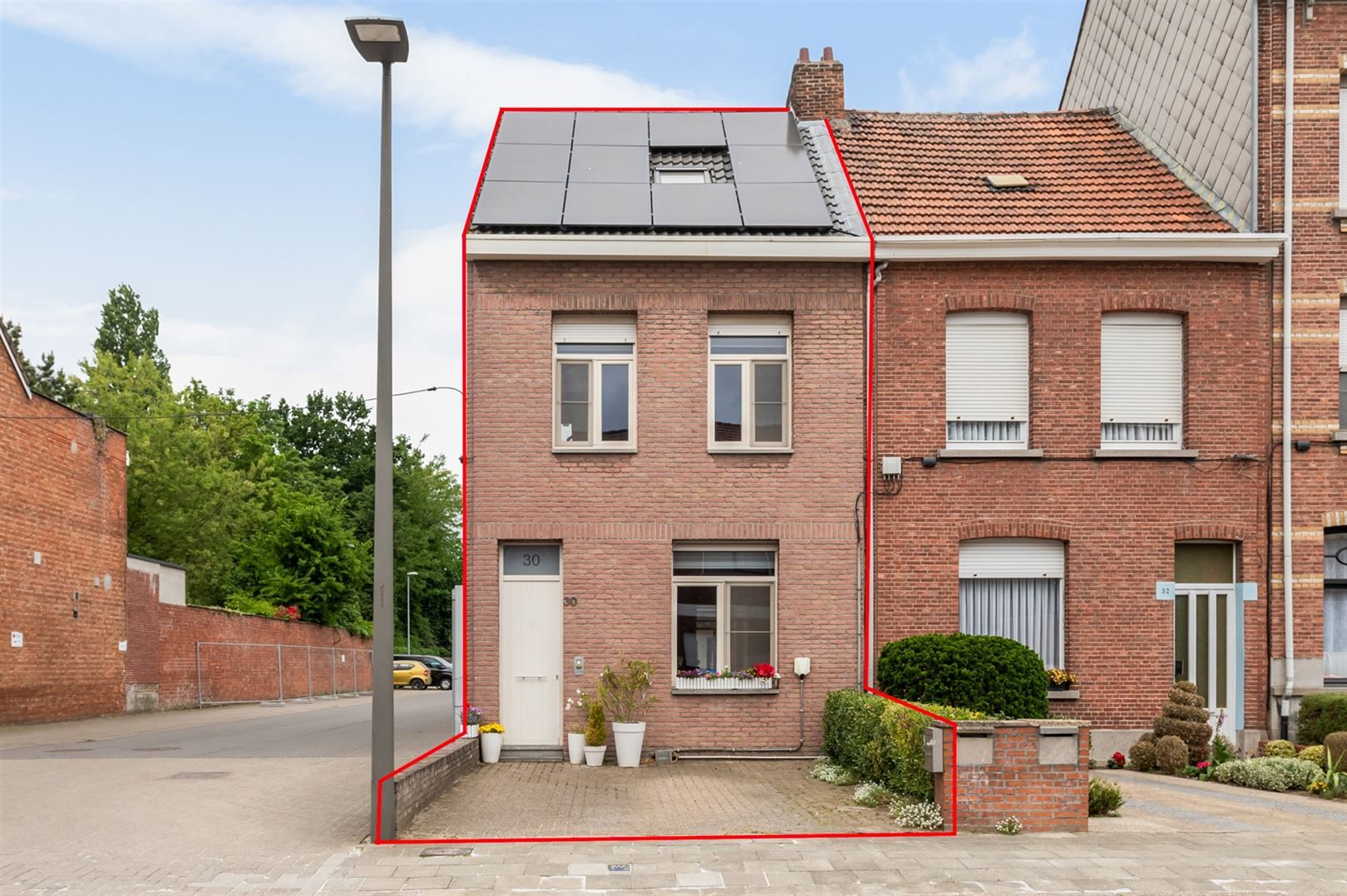 Centraal gelegen ééngezinswoning met 4 slaapkamers en tuin. foto 18