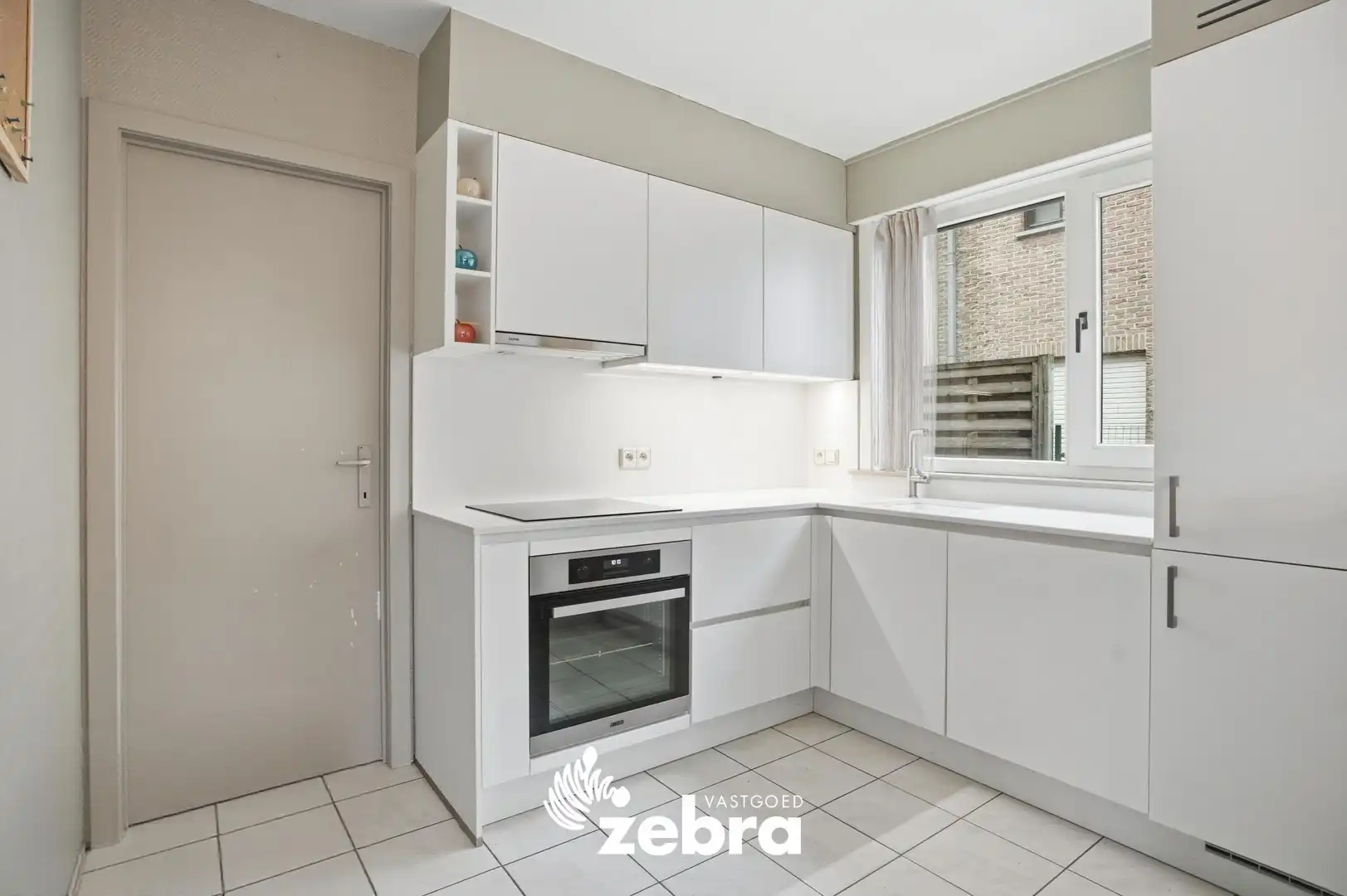 Instapklaar gelijkvloers appartement met tuin van 116 m² en garage! foto 6