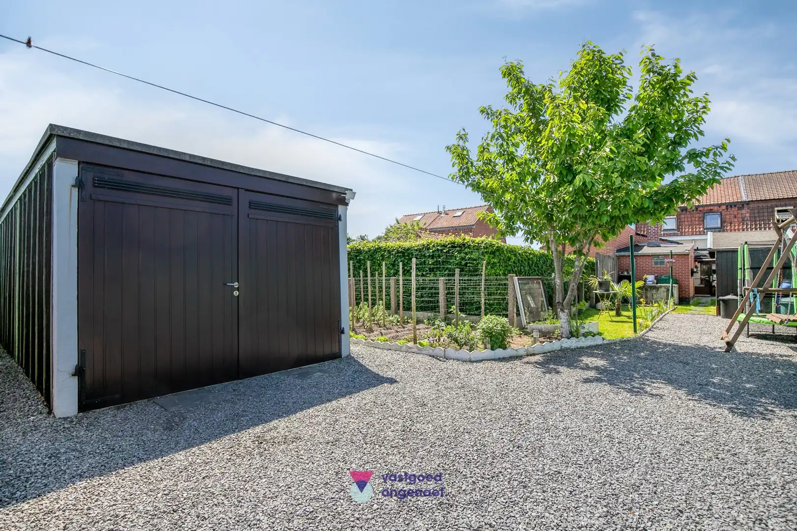 Charmante gesloten woning met zonnige tuin en garage foto 11