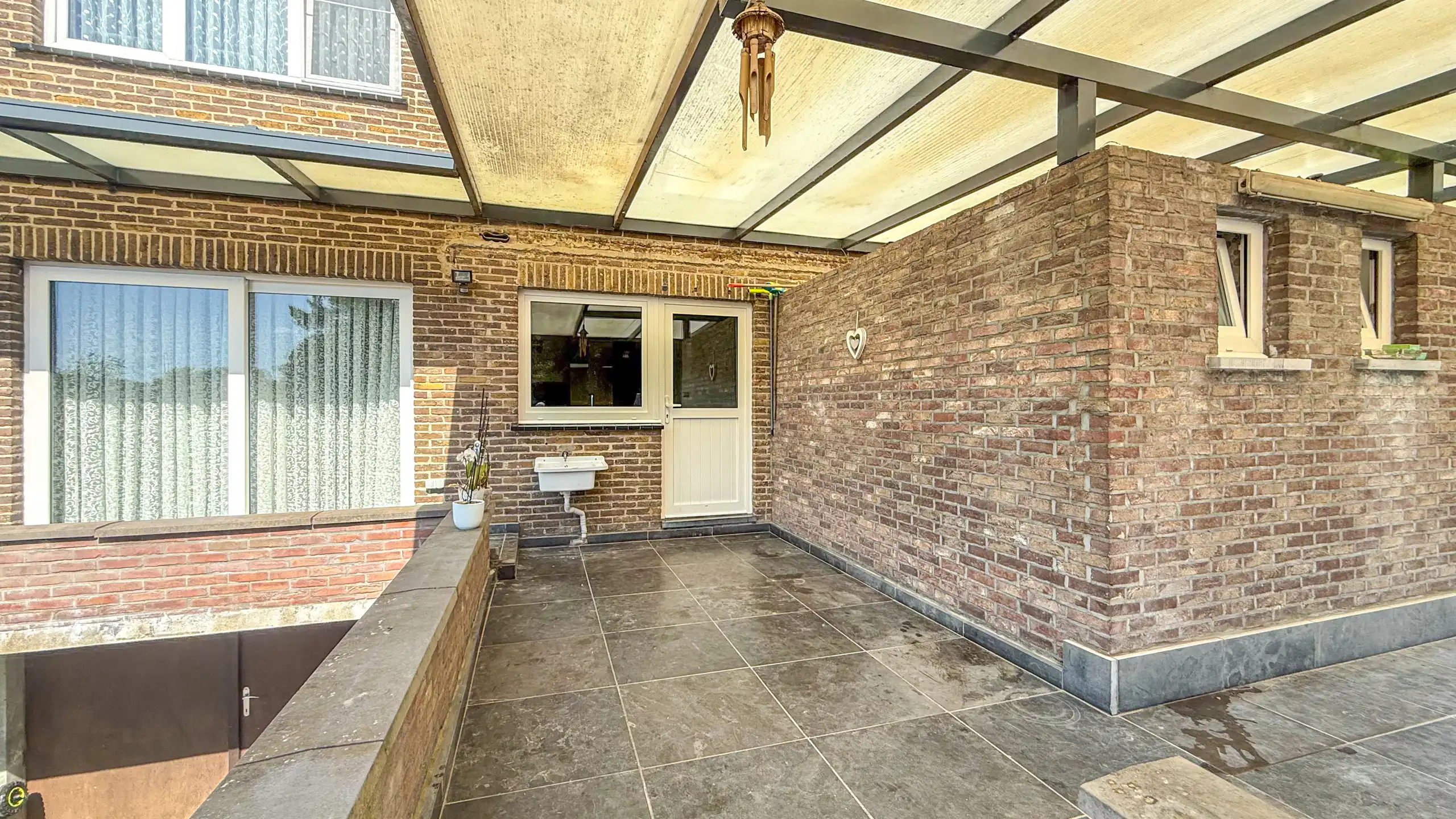 Instapklare woning met 3slpks, kelder en mooie tuin in Ham! foto 43