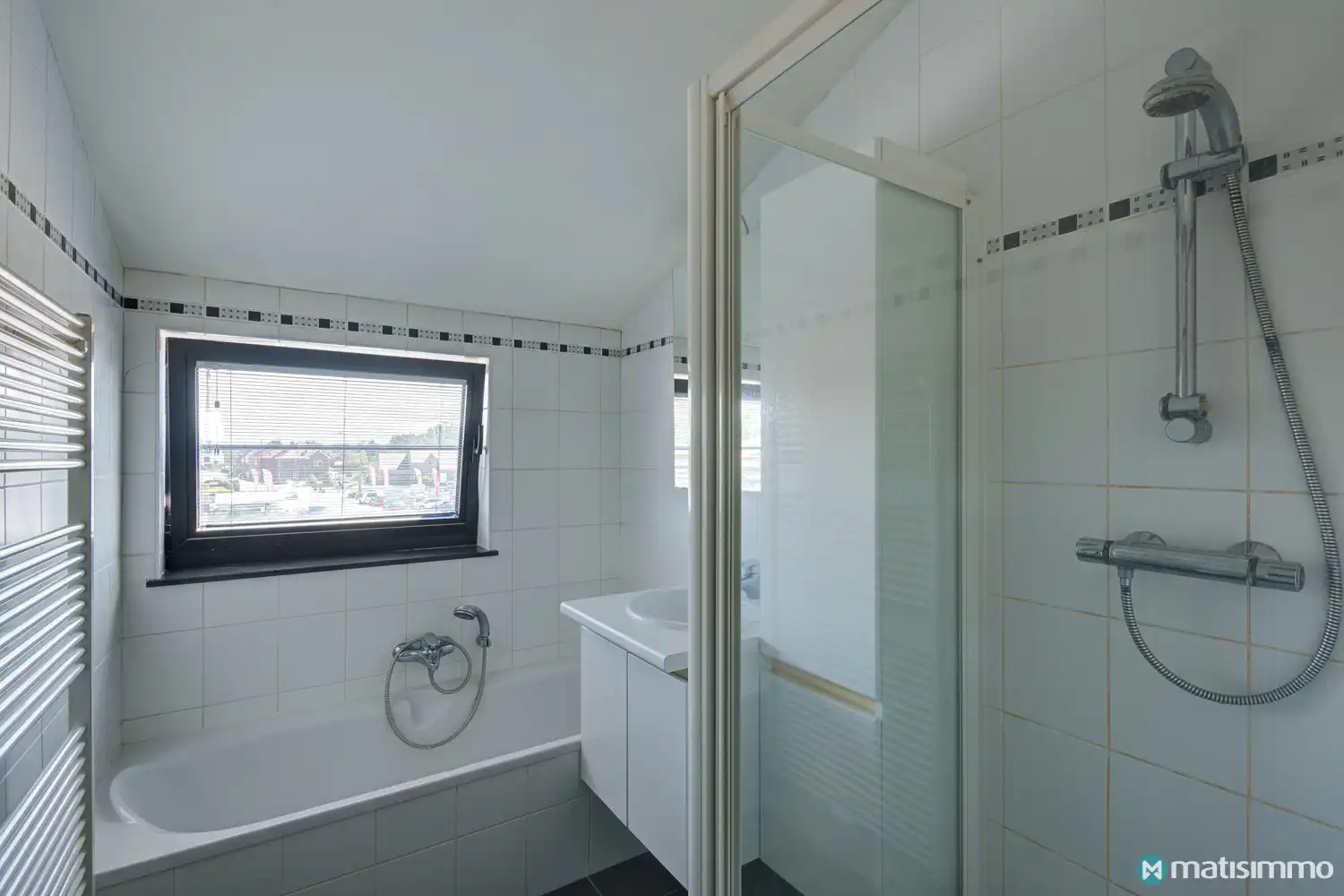 DUPLEXAPPARTEMENT MET 2 SLAAPKAMERS EN PARKEERPLAATS TE BEVERST foto 9