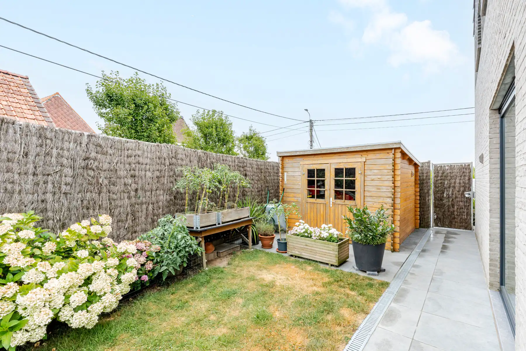 Gezellige recente halfopen bebouwing met tuin en staanplaatsen foto 23