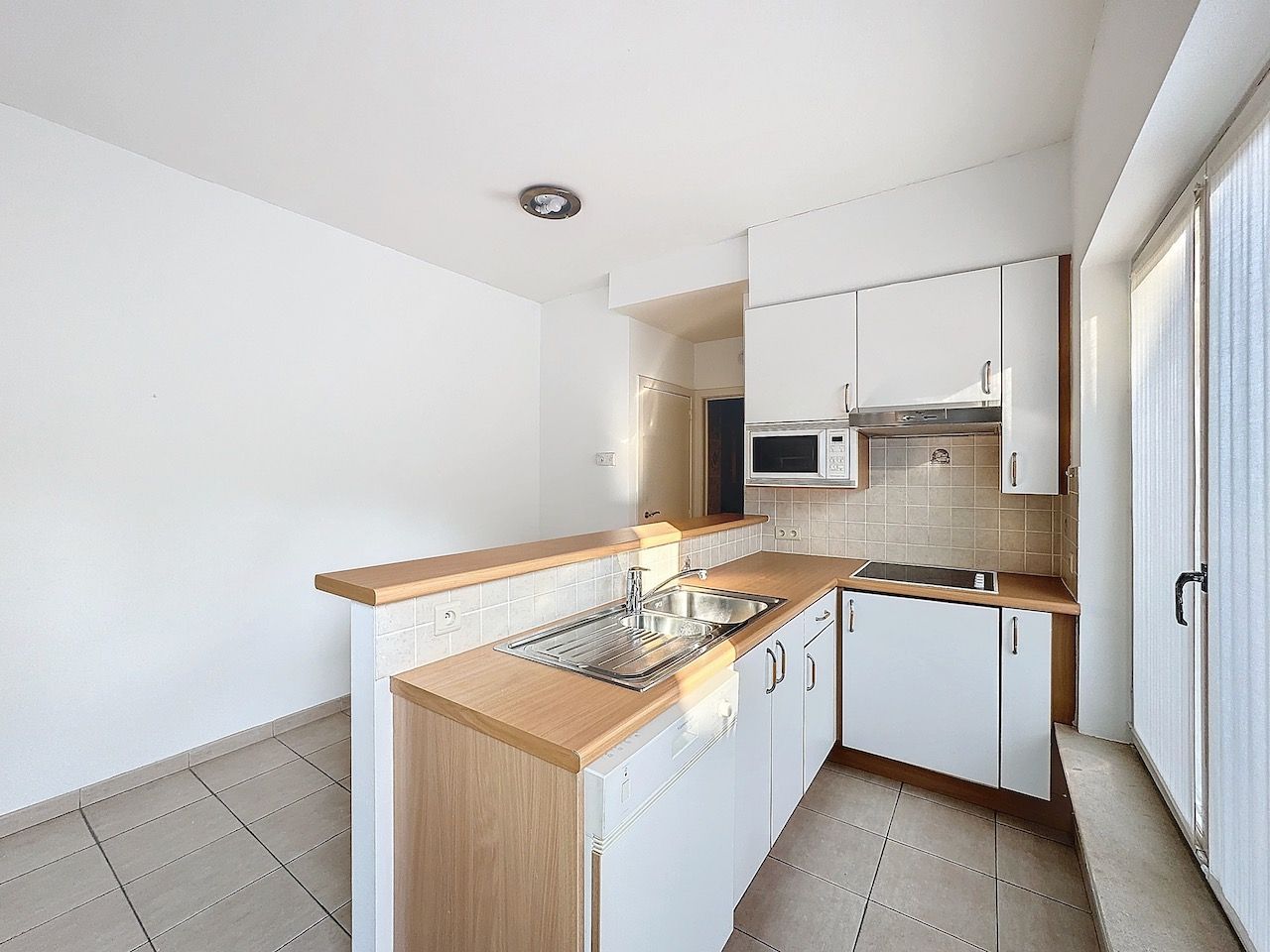 Gezellig gelijkvloers appartement op wandelafstand van de Graaf d'Ursellaan & de Zeedijk foto 10