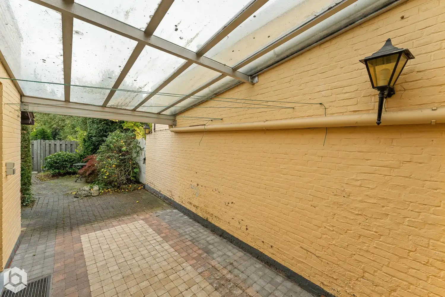 Te renoveren woning met 3 slpkrs, 2 garages en tuin in Mechelen foto 19