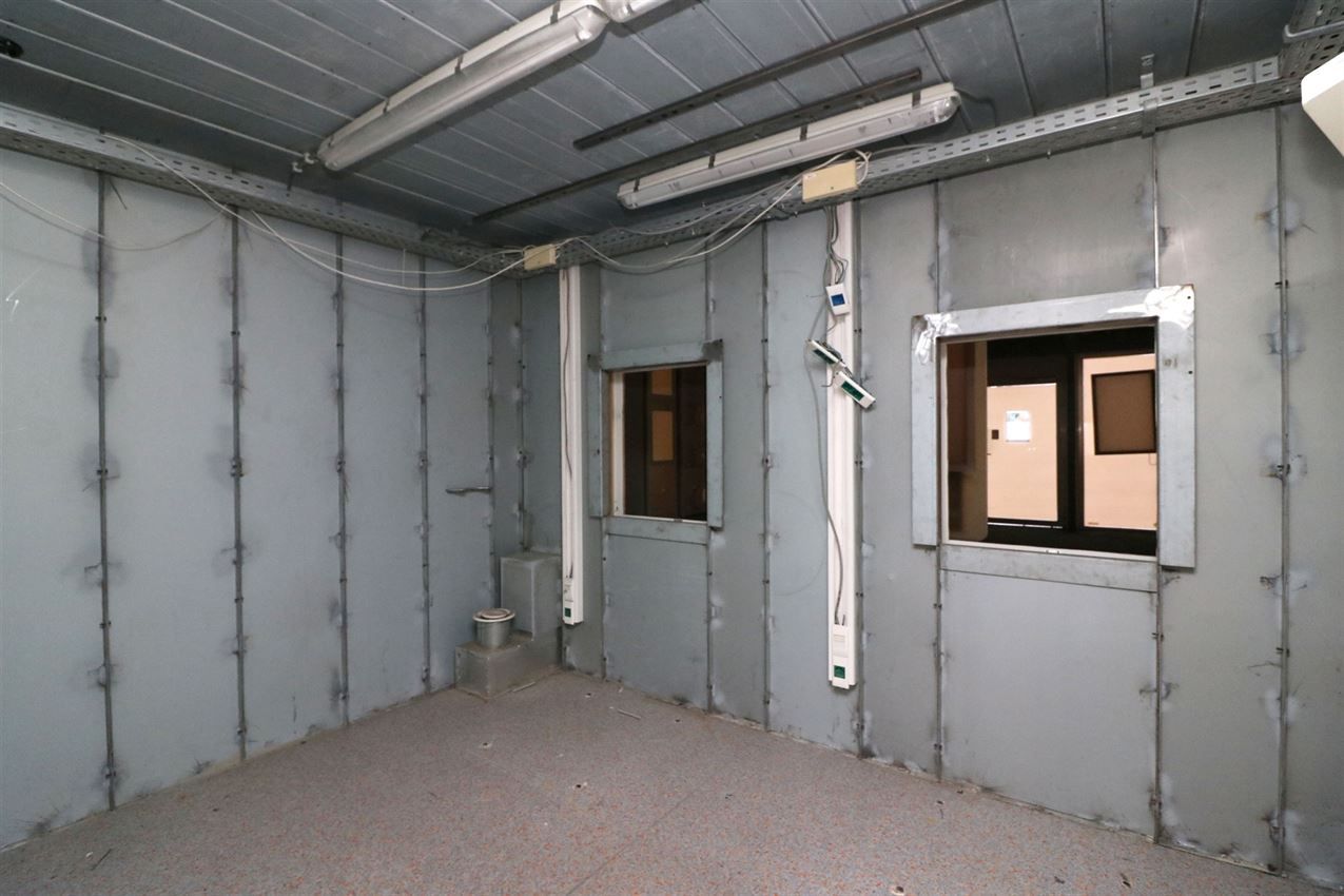 Opbrengsteigendom (handel & 4 app) op toplocatie foto 11