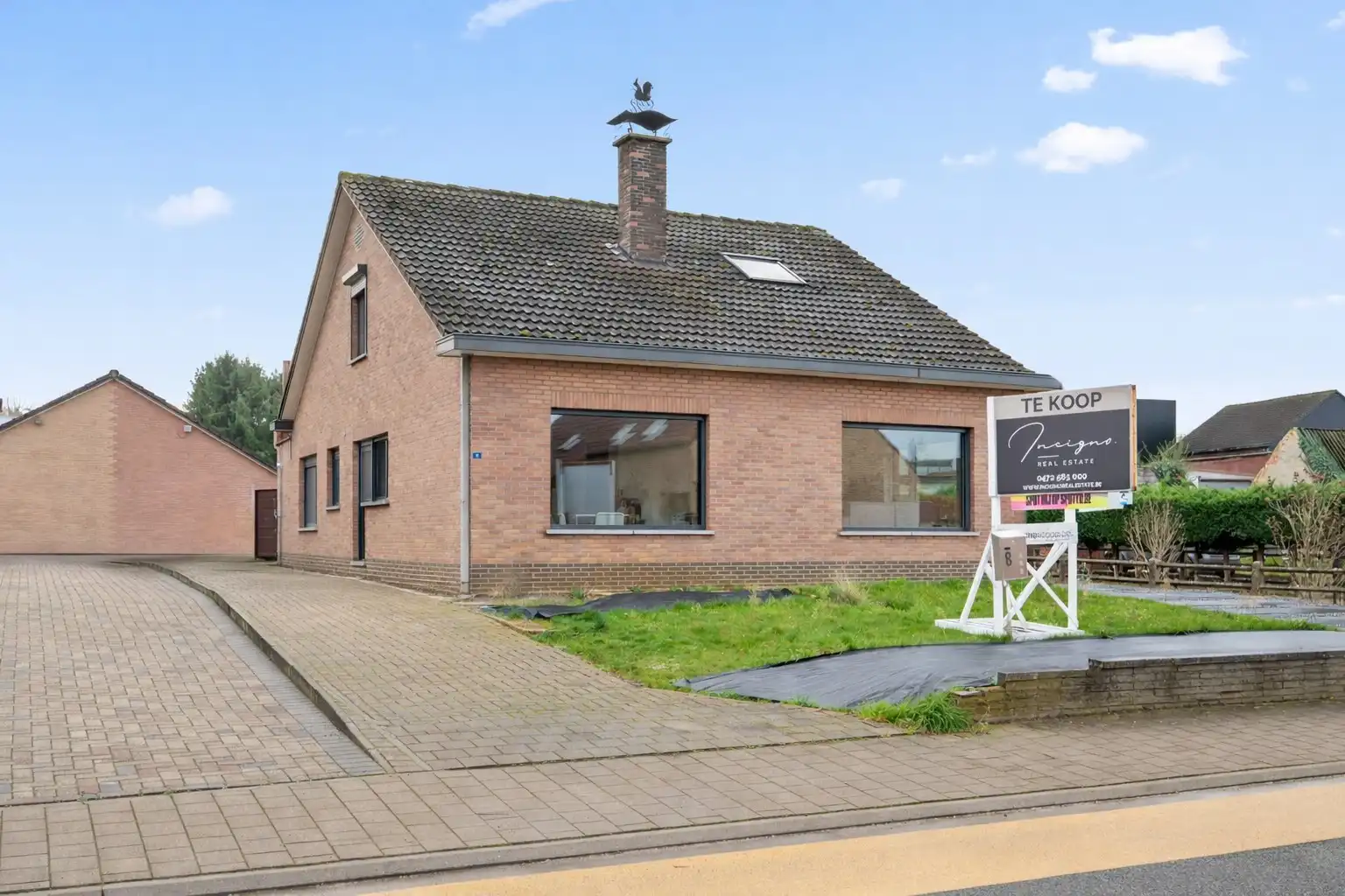 Ruime gezinswoning met ruime tuin en aparte garage foto 2