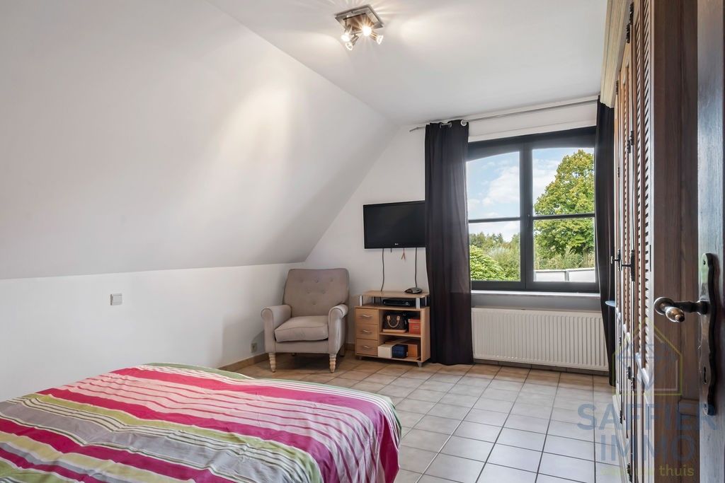 Ruim appartement met 3 slaapkamers, garage en tuin te huur foto 11