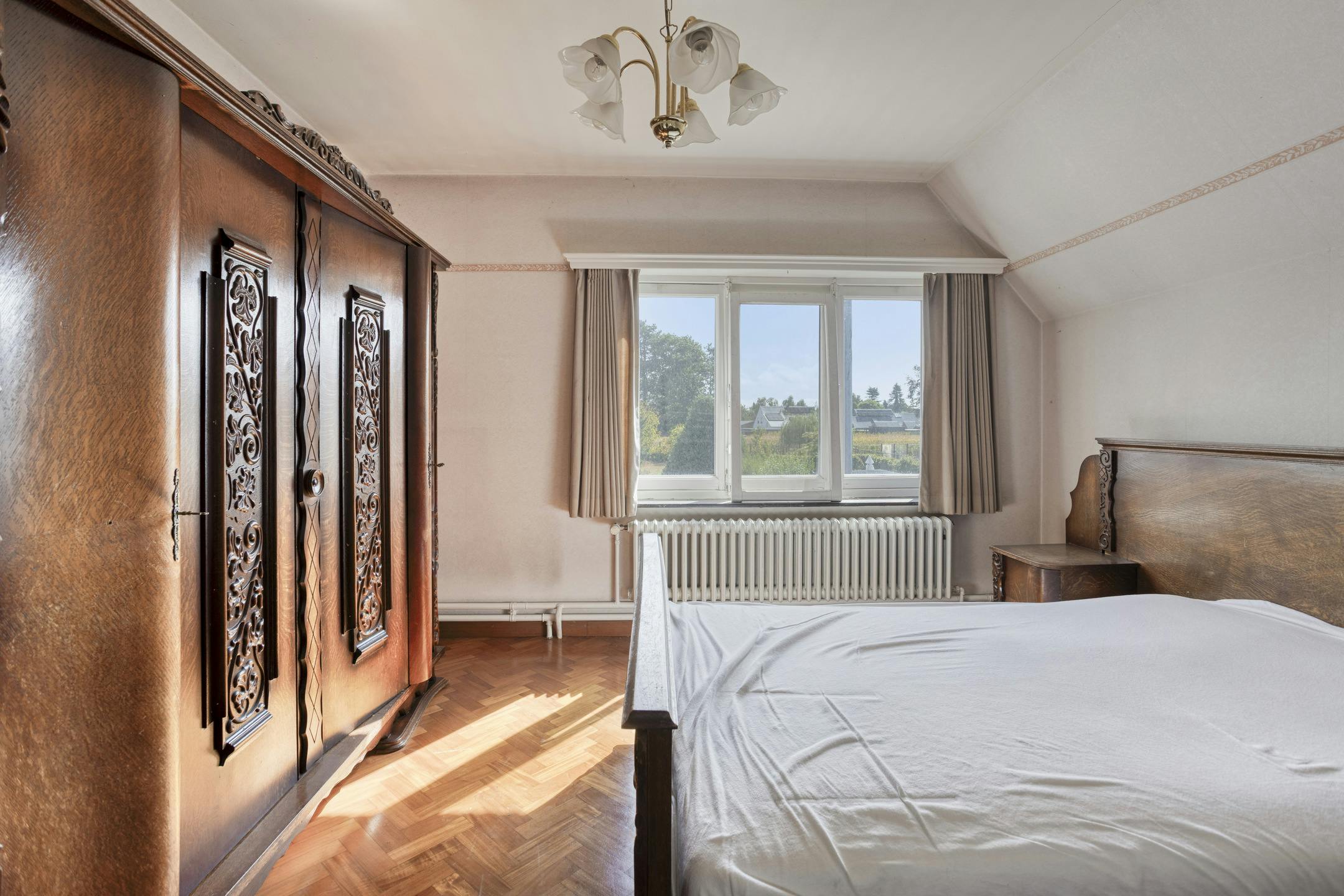 Te renoveren woning te koop net buiten het centrum van Retie foto 18