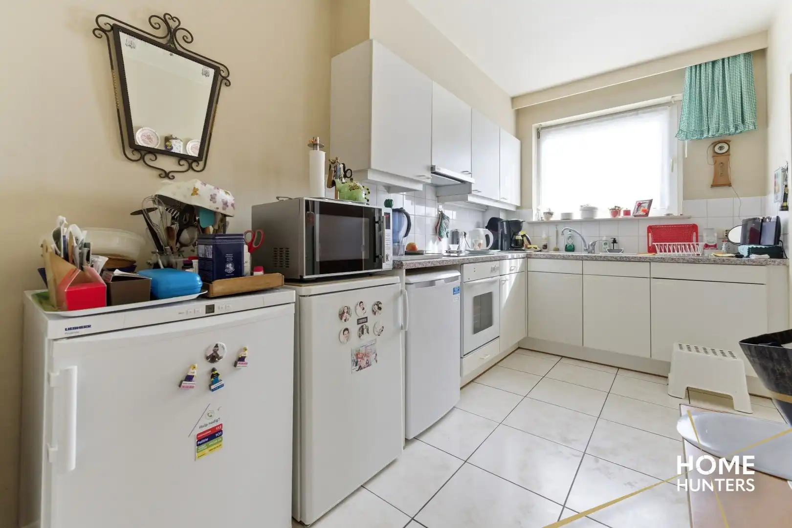 Instapklaar gelijkvloers appartement met 2 slaapkamers en ruime tuin foto 12