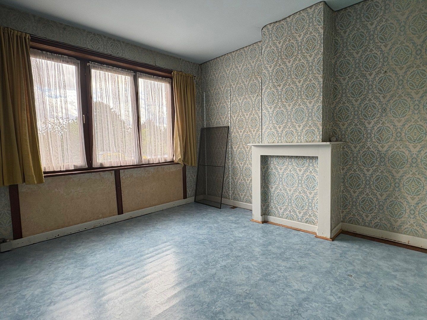 Te renoveren woning met 4 slaapkamers, tuin, uitweg en garage te koop in Harelbeke foto 6