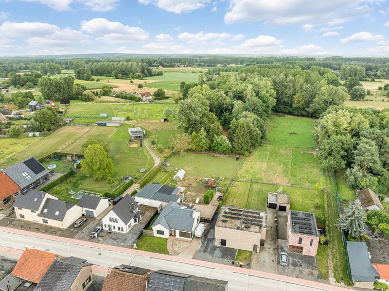 Woning met rustig gelegen, achterliggende weide en bos op 82are foto 32