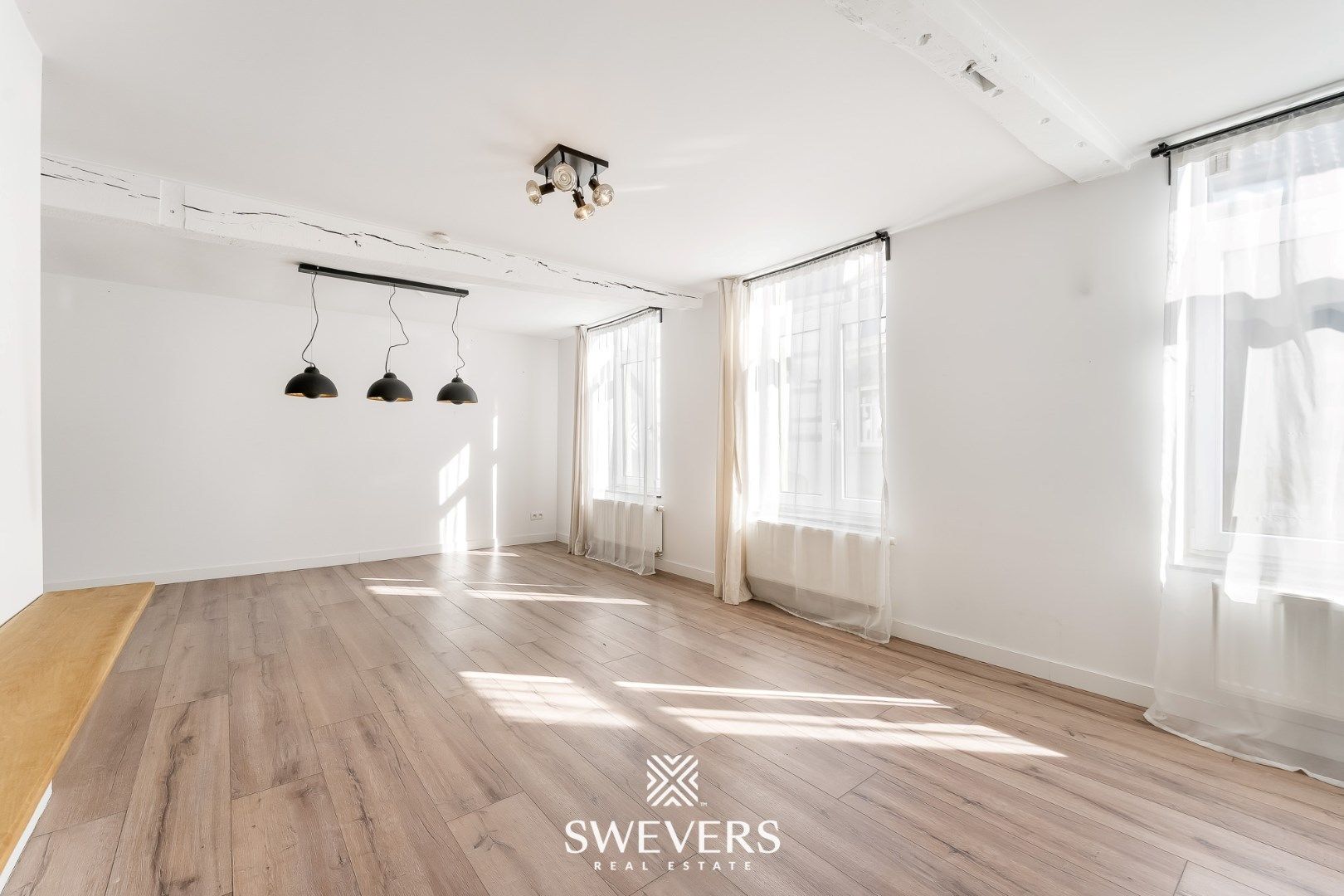 Ruim duplex appartement met knusse stadstuin in hartje Borgloon foto 7