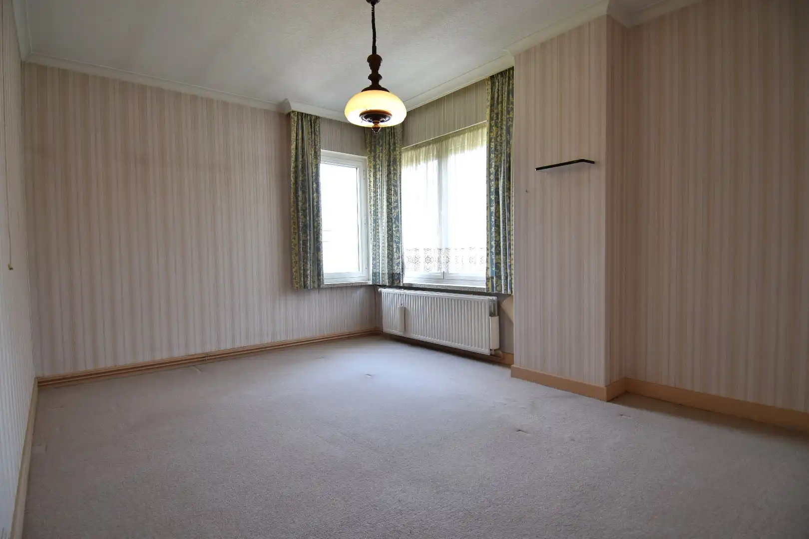 Halfopen bebouwing mét aanliggend lot bouwgrond te koop vlakbij centrum Menen foto 9