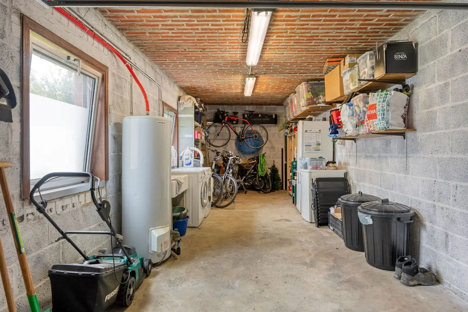 Instapklaar gelijkvloers appartement met 2 slaapkamers, garage en zonnige tuin foto 18