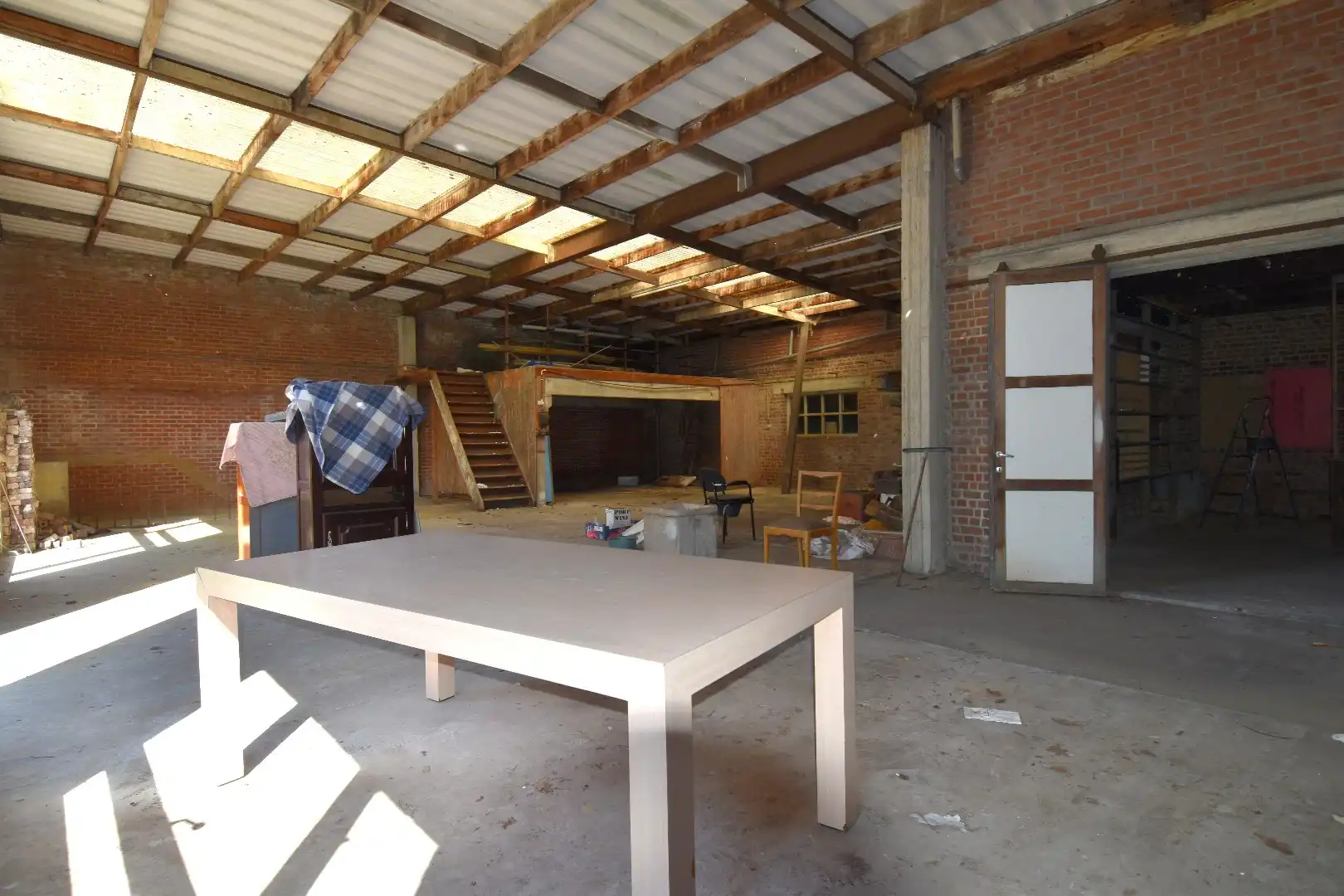 Alleenstaande woning met achterliggende opslag ruimte (205 m²) te koop in Heule foto 18