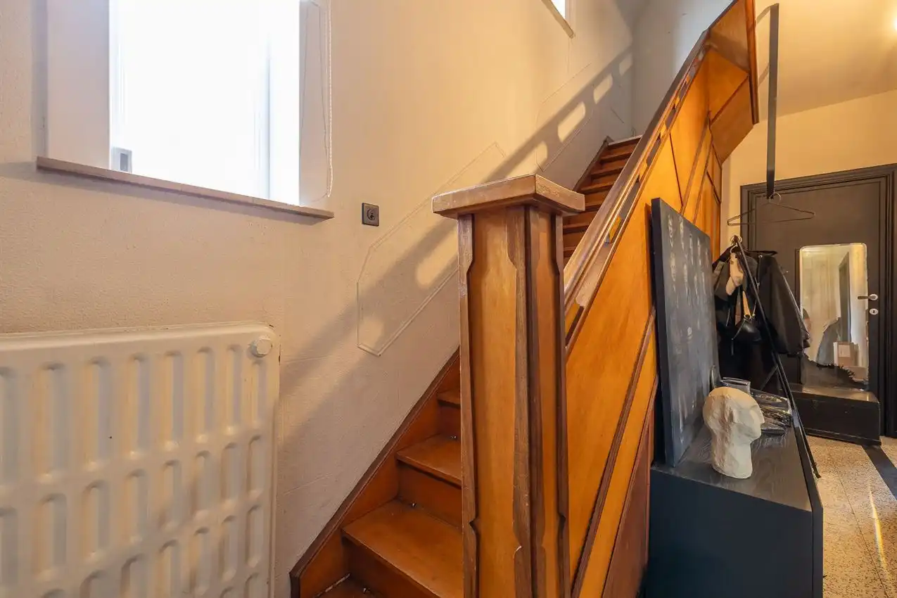 Centraal gelegen woning met garage, 3 slpk. en tuin foto 15