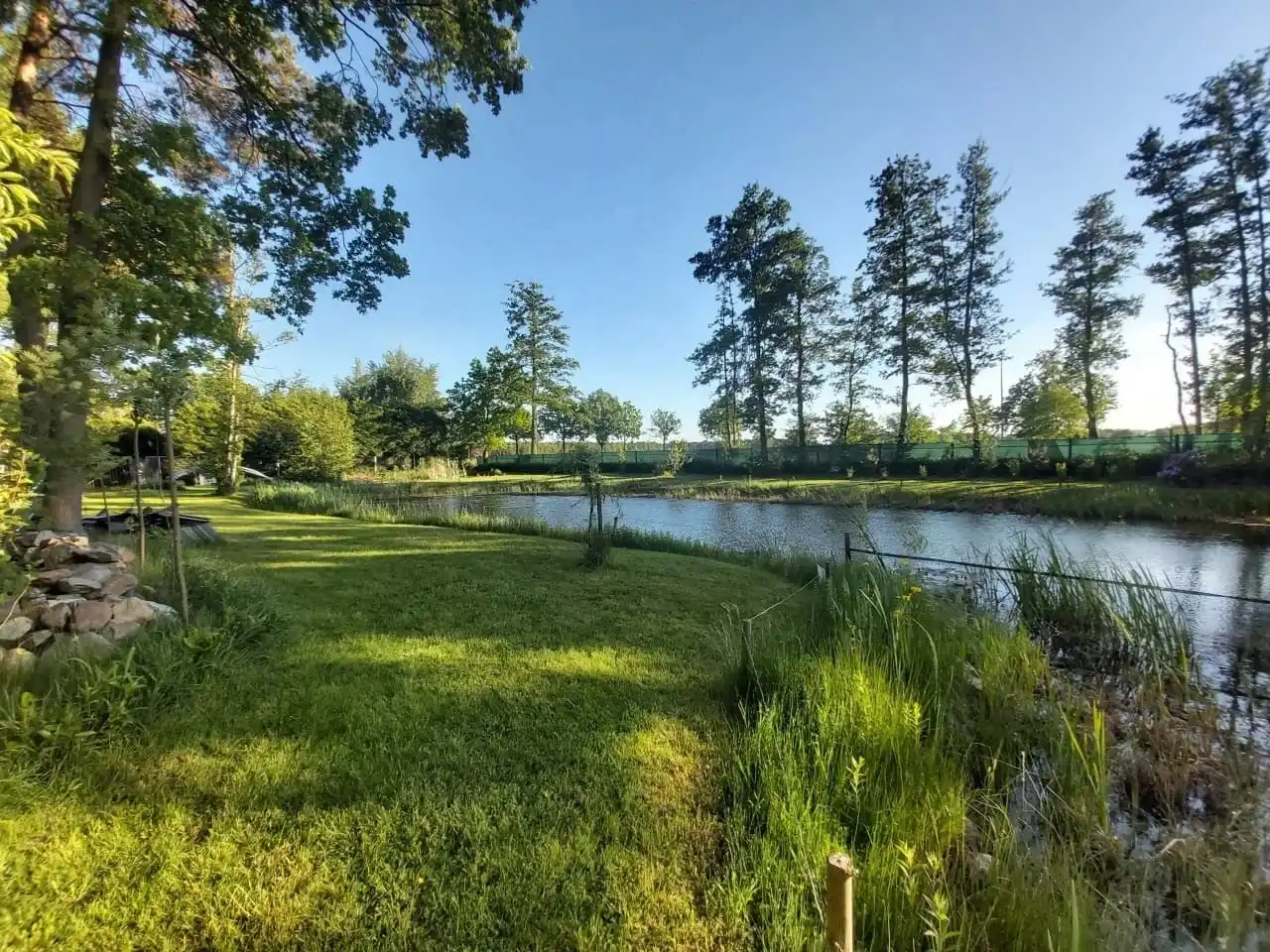 Uniek stuk recreatiegrond met vijver en bouwmogelijkheid – 2154 m². foto 7