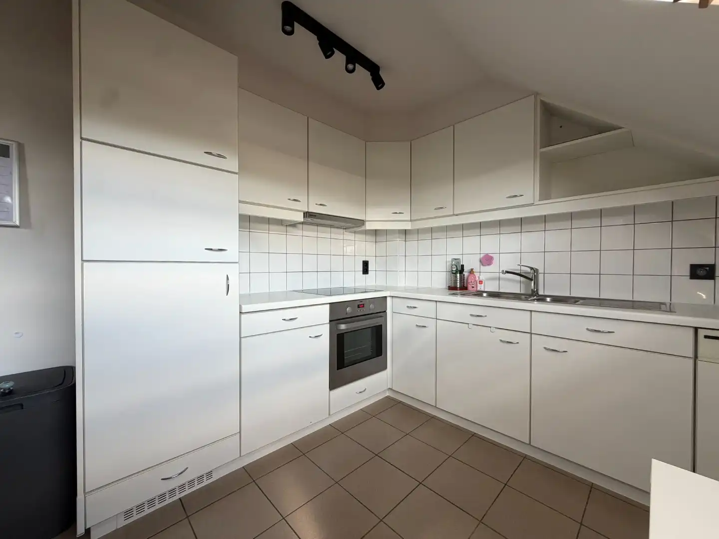 Verzorgd appartement met 2 slaapkamers in kleinschalige residentie vlakbij het centrum van Munsterbilzen foto 13