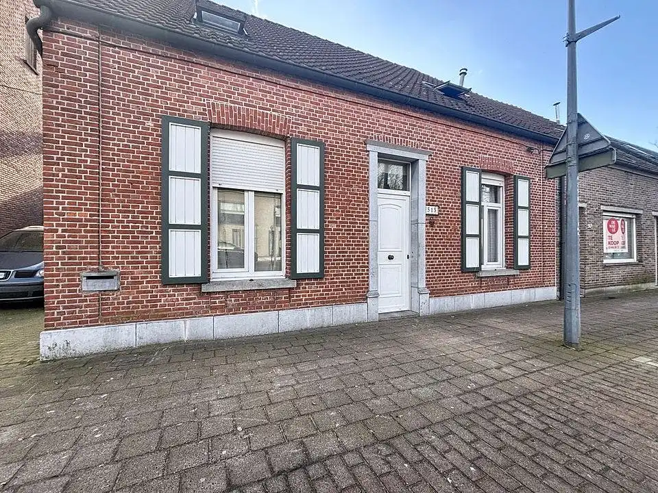 Ruime gezinswoning met diepe tuin in centrum Wuustwezel foto 2