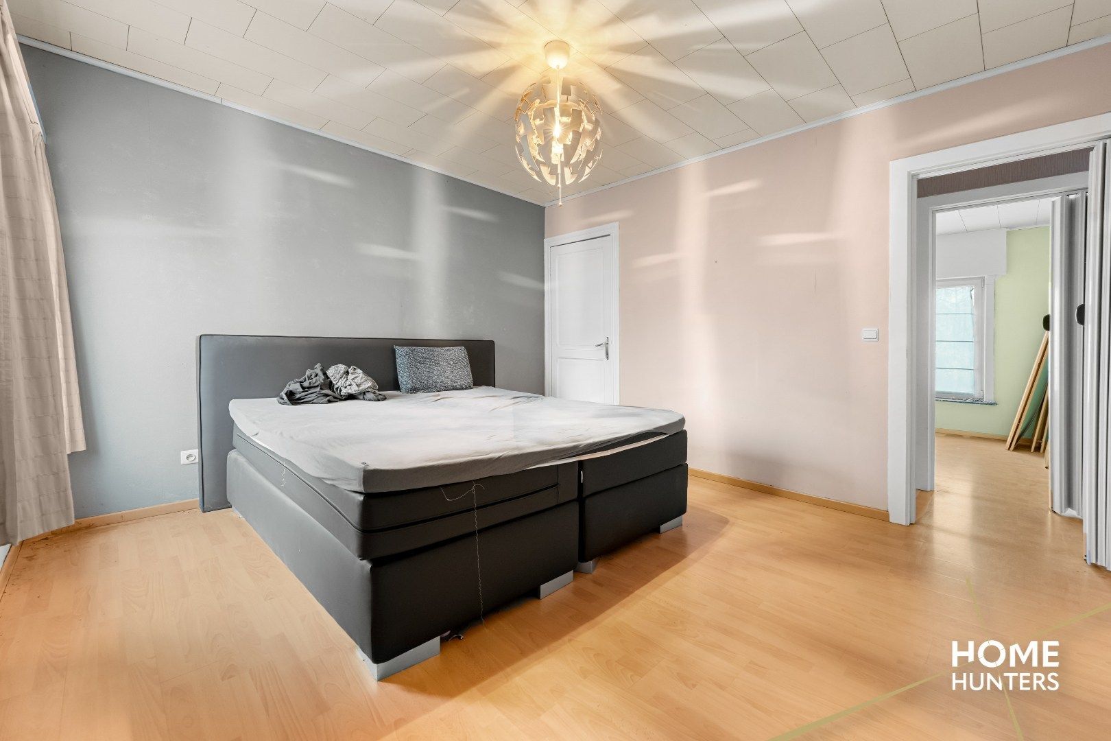 Charmante, op te frissen rijwoning met ruime tuin en 3 slaapkamers foto 17