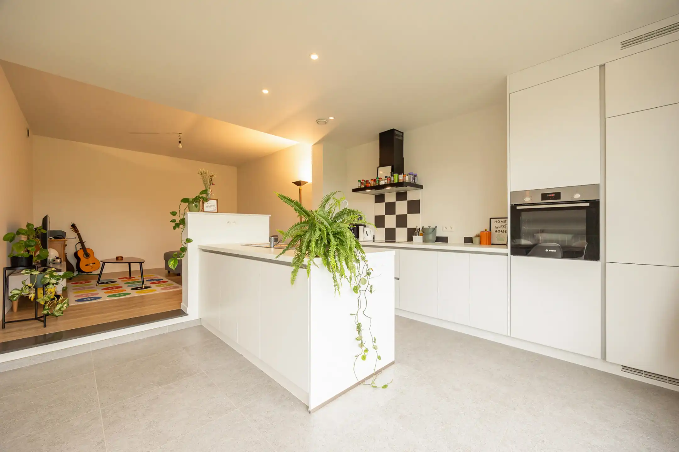 Duplex appartement met twee slaapkamers en tuin foto {{pictureIndex}}