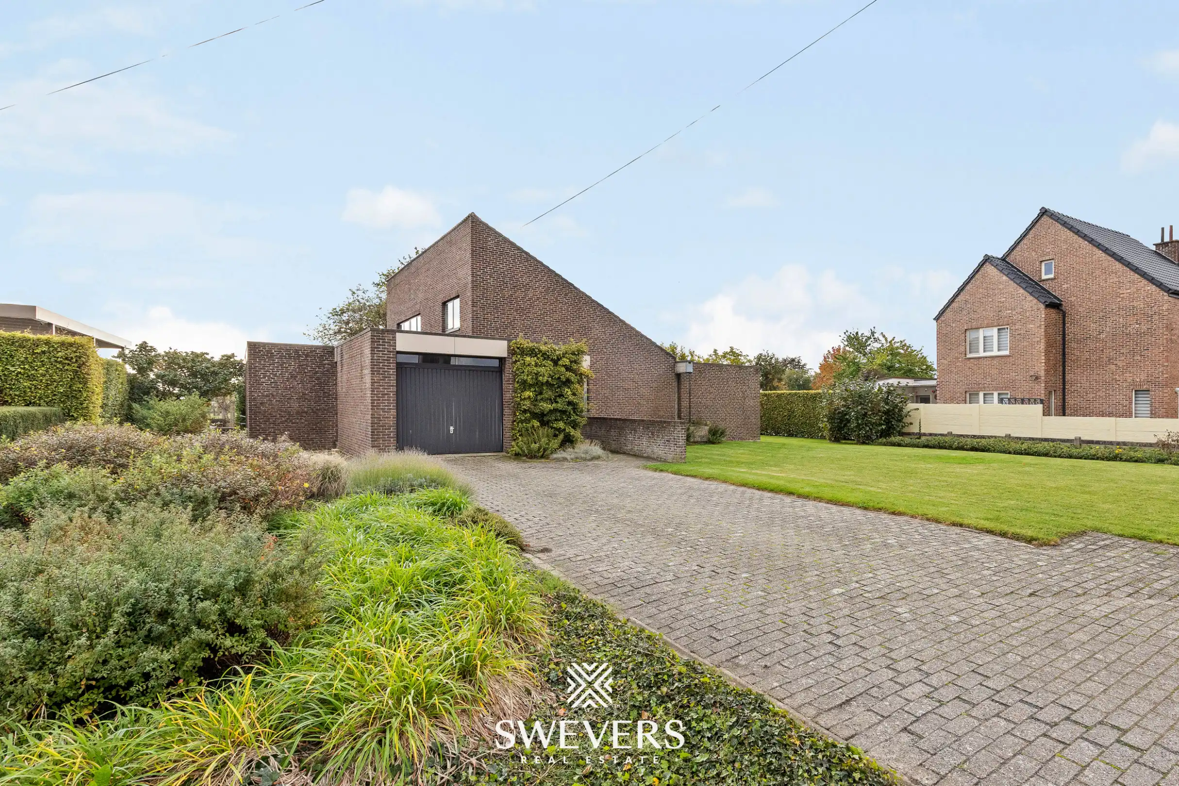 Vrijstaande woning op 13 are met mooie tuin en achterliggende toegang in Alken foto 34