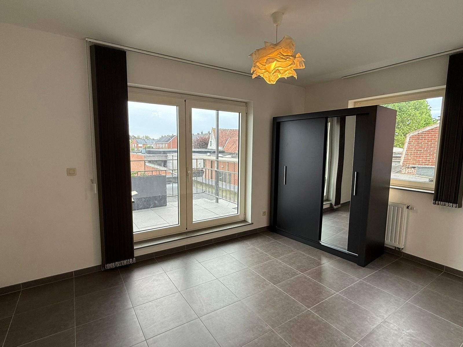 Lichtrijk tweeslaapkamerappartement met ruim terras in het centrum van Ingelmunster foto 7