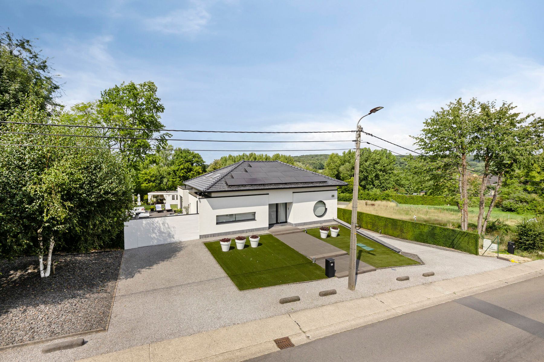 Prachtige moderne, energiezuinige villa in het groene Dworp foto {{pictureIndex}}