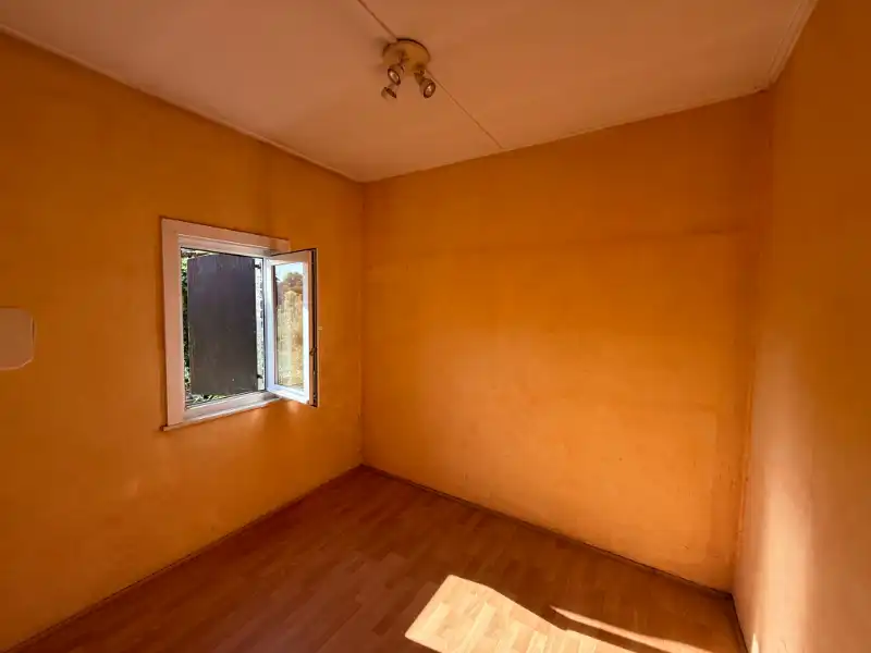 Te renoveren rijwoning met uitgang achteraan! foto 6