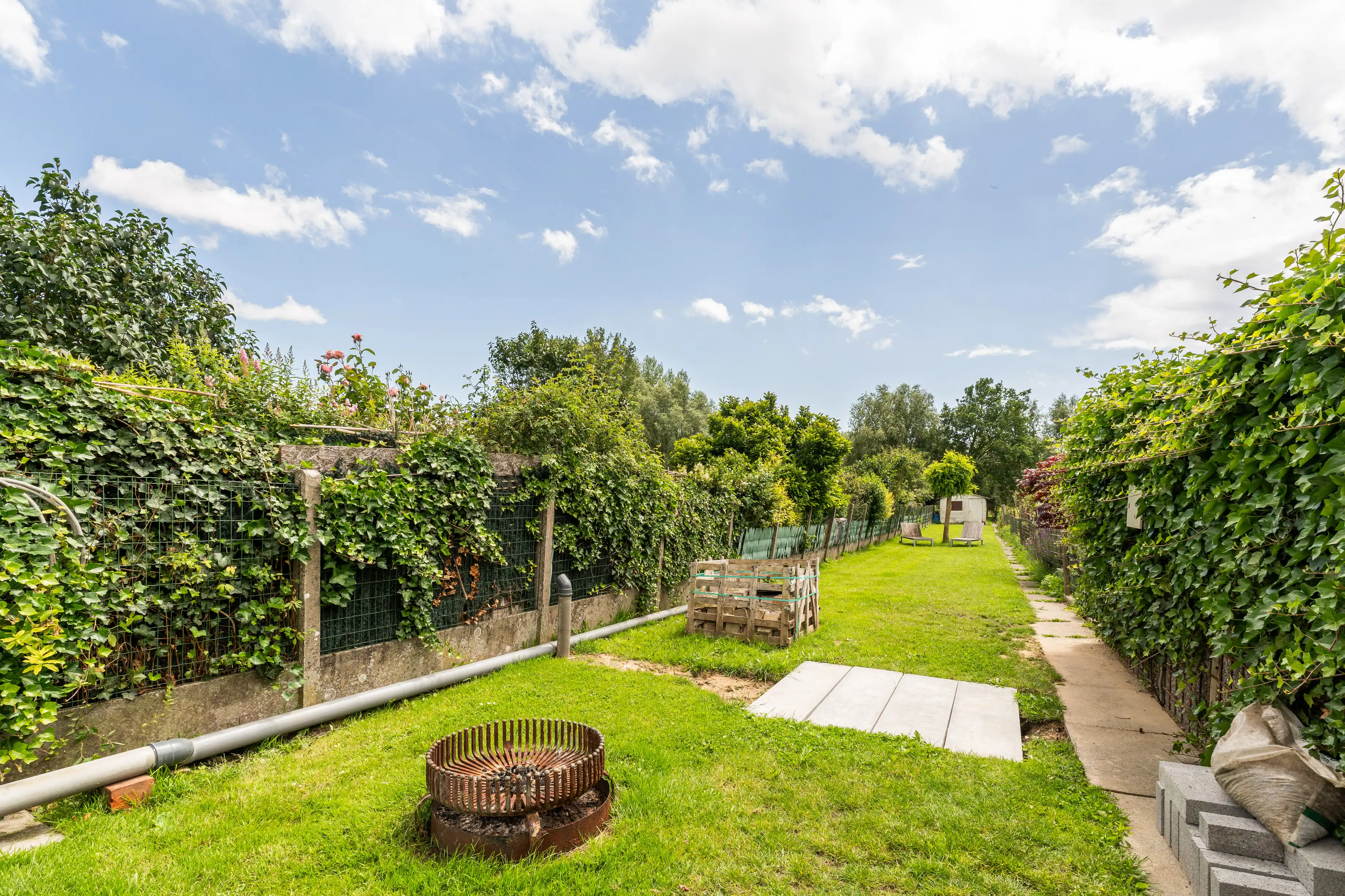Verrassend ruime woning met zonnige tuin nabij het Muziekbos foto 14