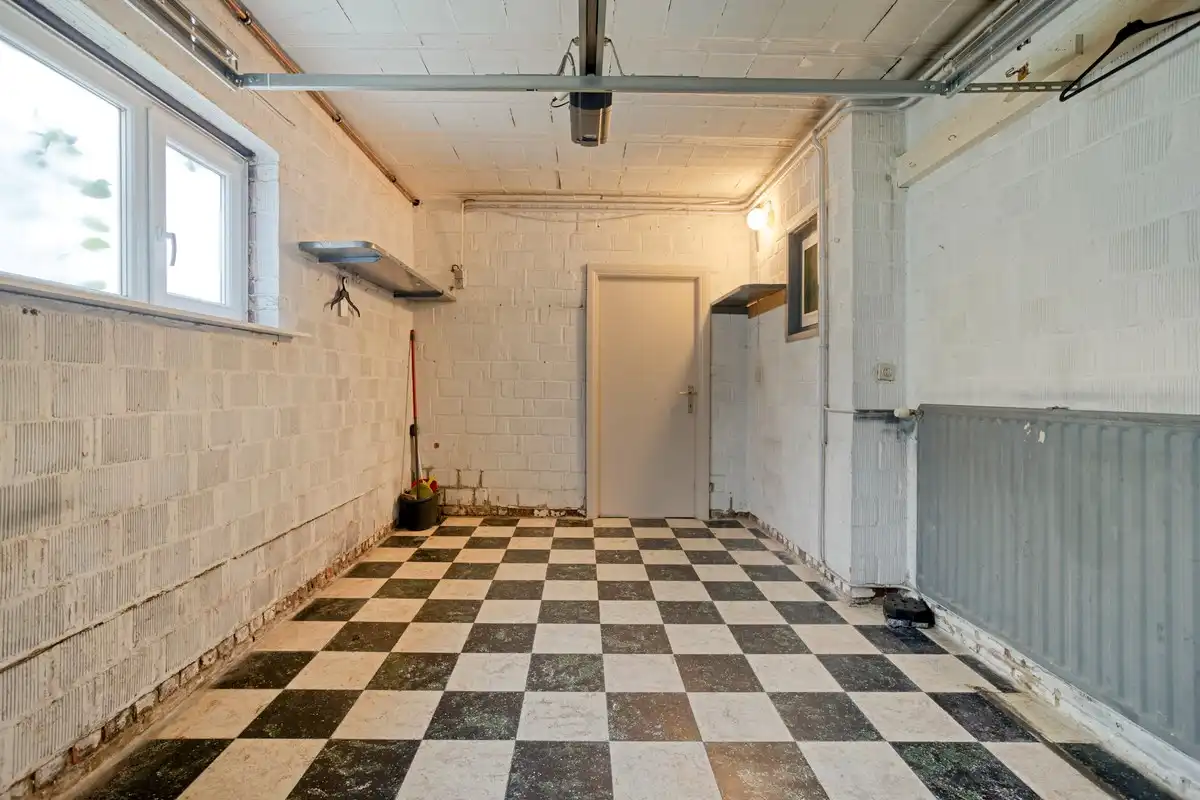 Op te frissen gelijkvloerse woning met 1 slaapkamer en garage! foto 12
