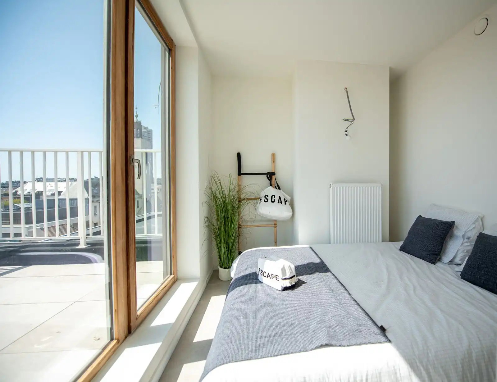 Nieuwbouw penthouse appartement met zonnige terrassen in hartje Oostende foto 9