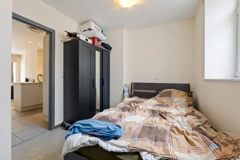 KNAP HANDELSPAND MET TWEE APART VERHUURDE APPARTEMENTEN IN HET CENTRUM VAN SINT-TRUIDEN foto 24