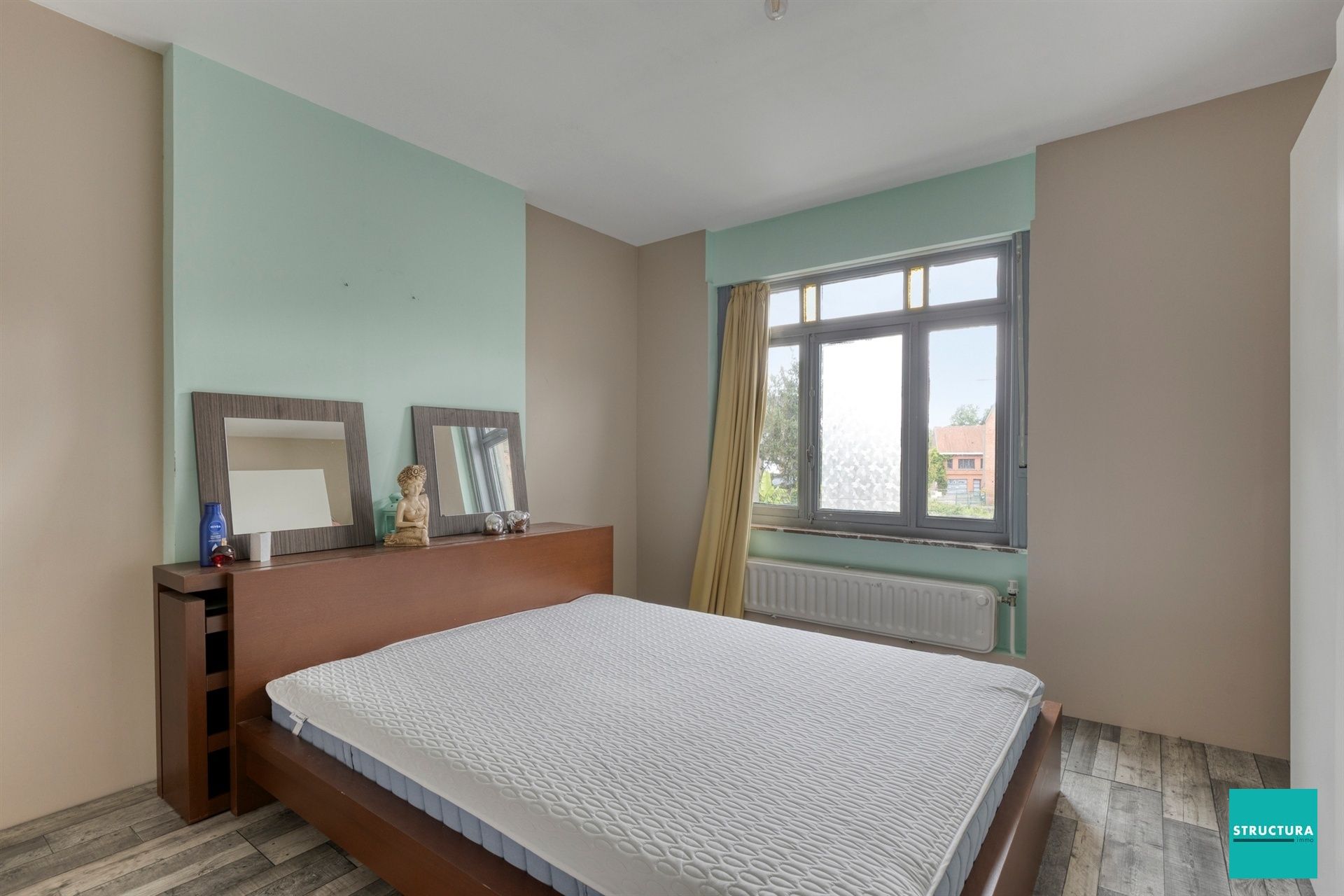 Ruime woning met potentieel in hartje Merchtem
 foto 11