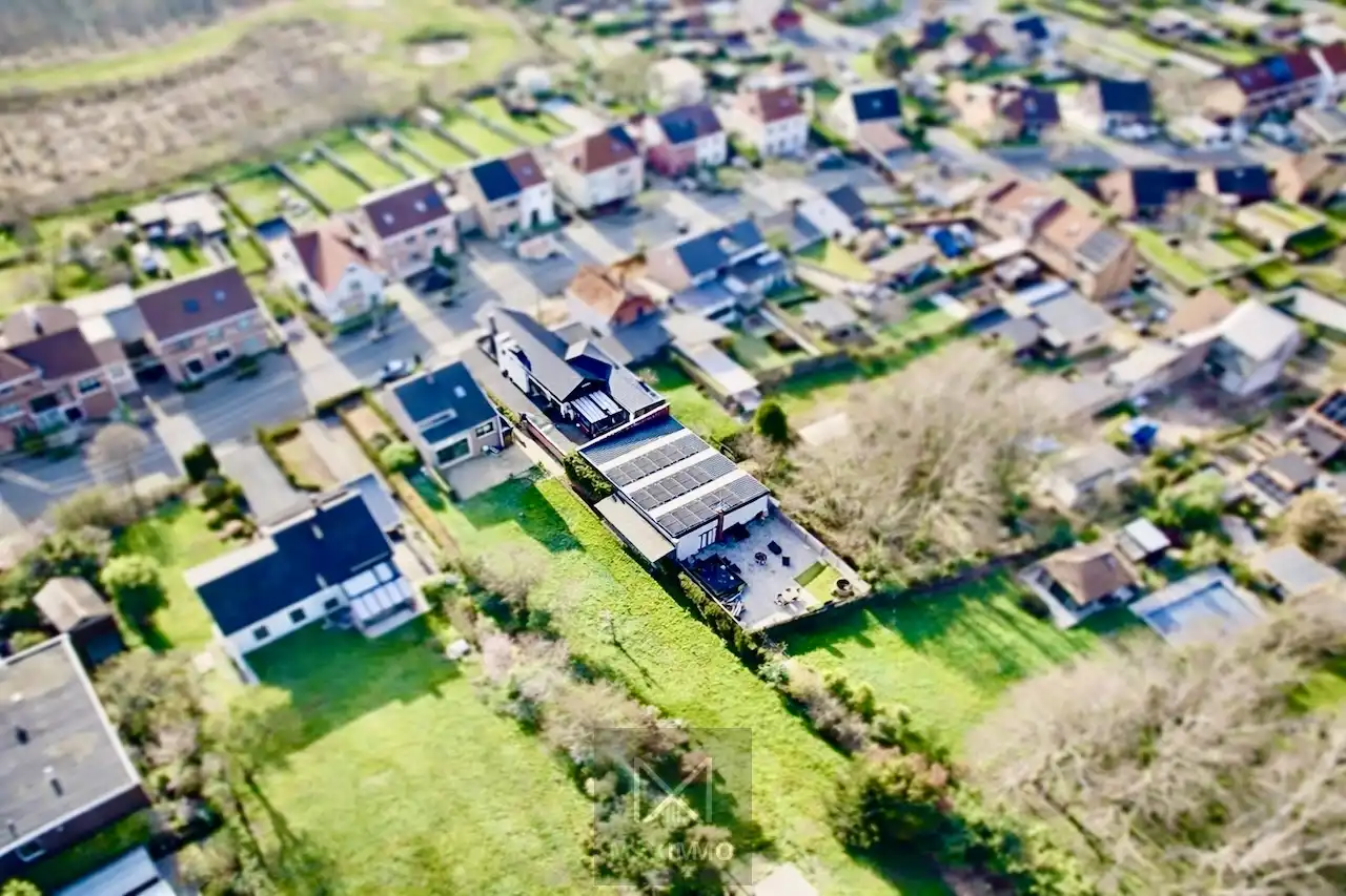 Volledig instapklare gelijkvloerse eigendom met loods van 180 m² op topligging foto 20