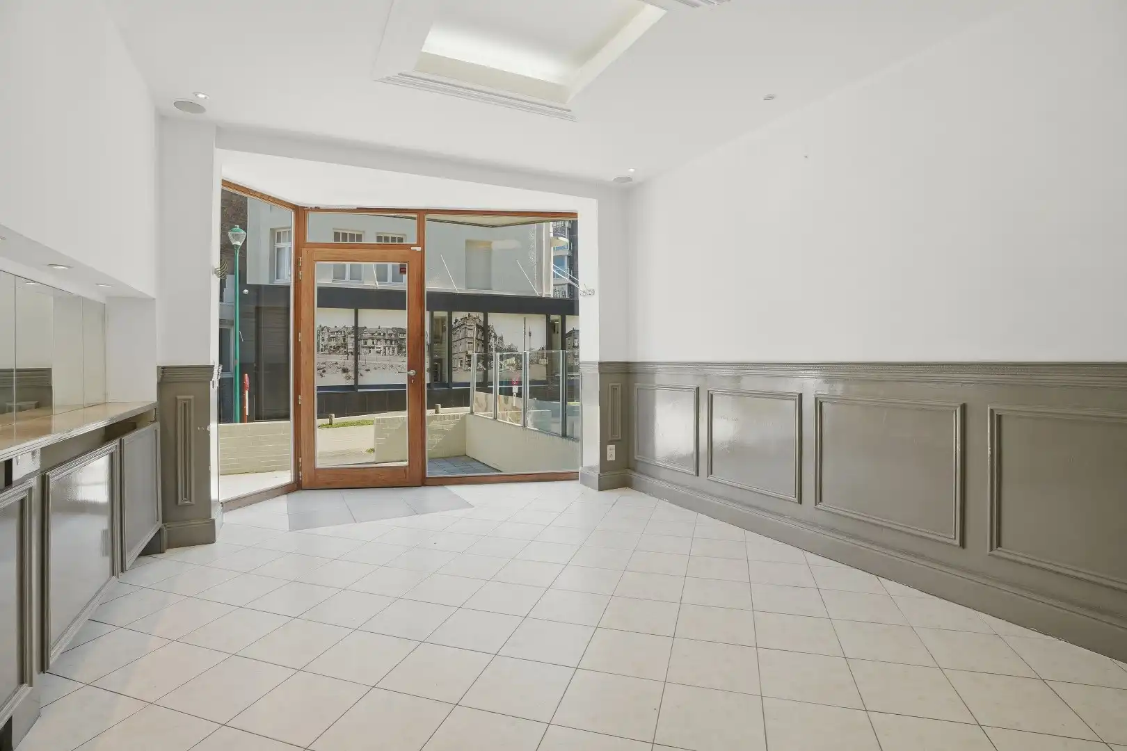 Goed gelegen gebouw op 117m² te De Panne bestaande uit een handelsruimte en woonst.  foto 8