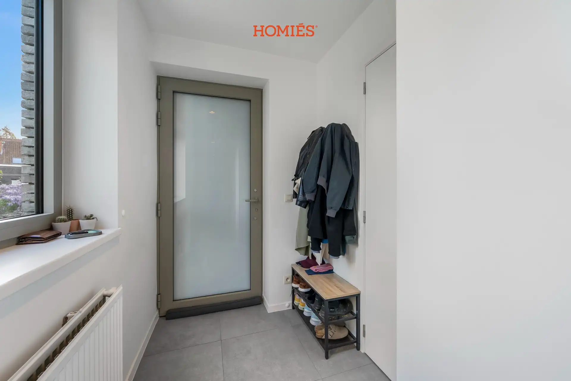 Modern 1-slaapkamerappartement met terras en staanplaats foto 8