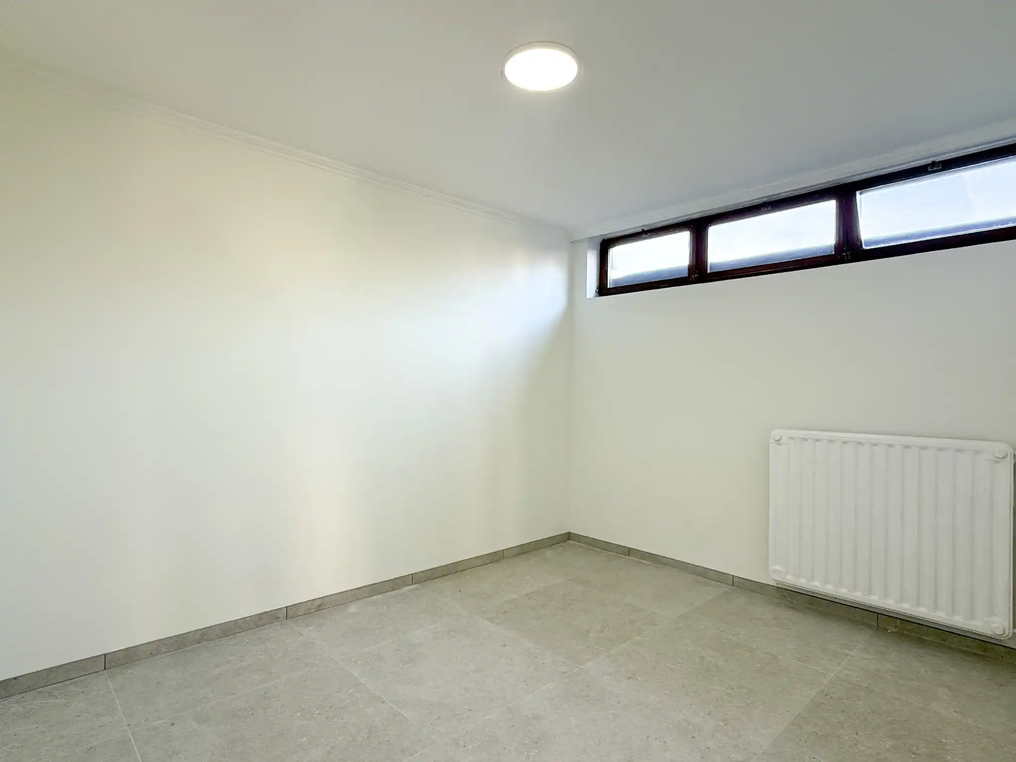 Gelijkvloers appartement met twee slaapkamers en garage in centrum Beveren foto 9