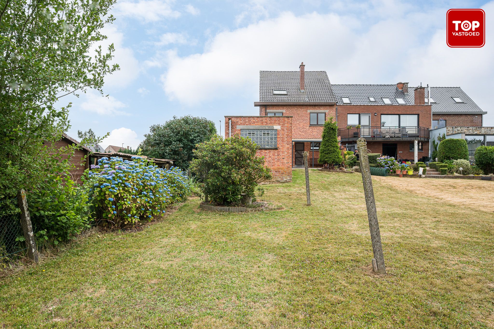 Ruime op te frissen gezinswoning met 4 slaapkamers,  zonnige tuin en garage. foto 29