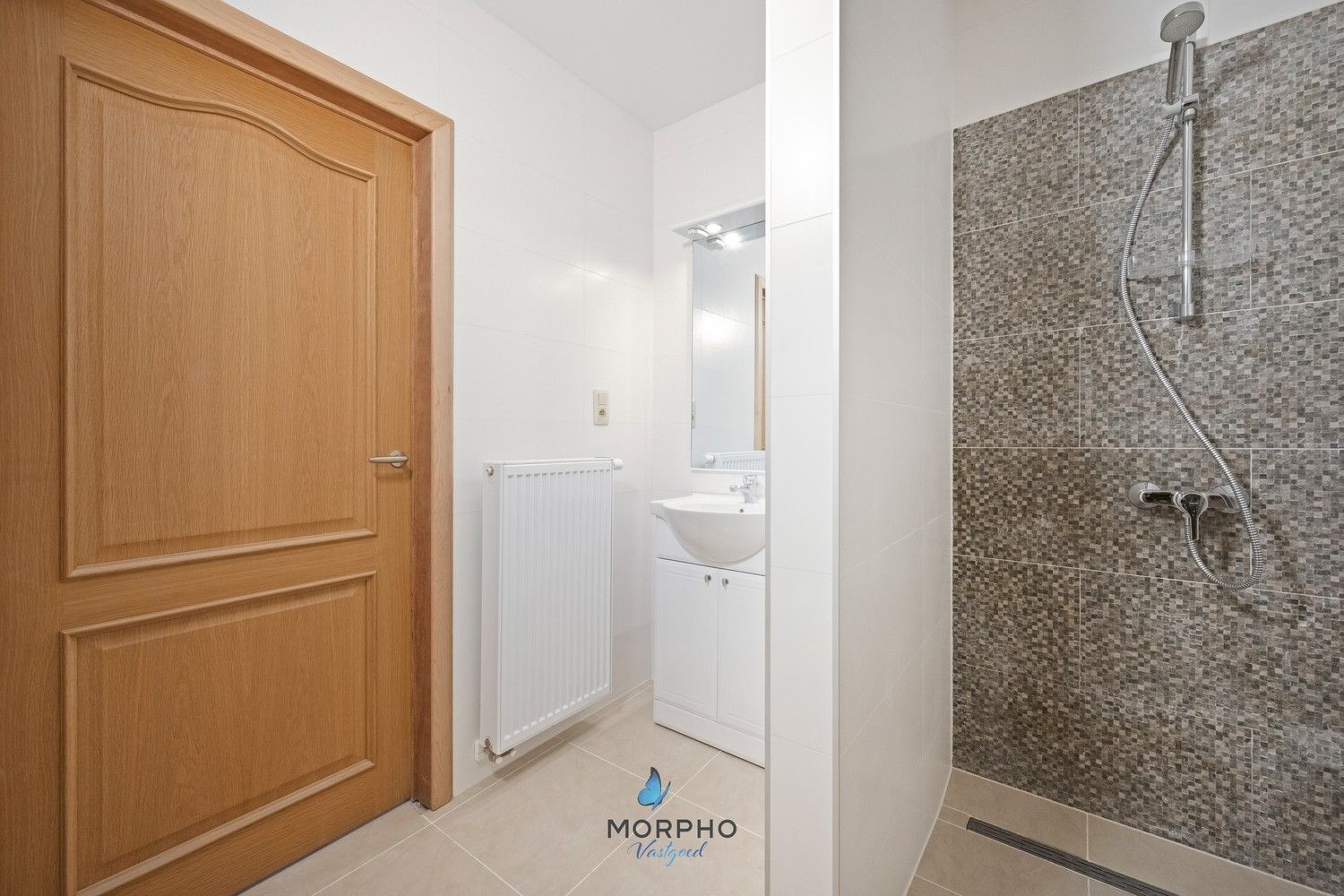 Modern en energiezuinig 2-slaapkamerappartement op de derde verdieping in hartje Temse! foto 13
