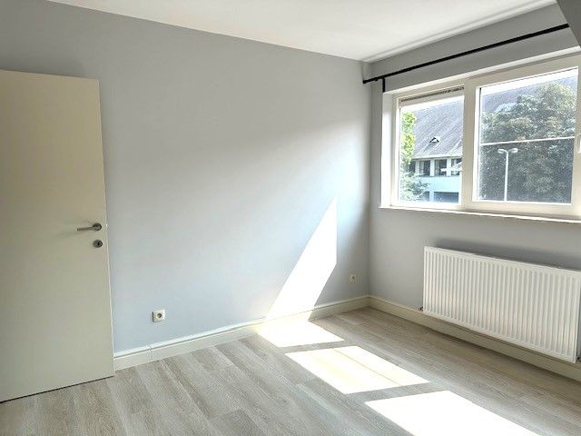 Trendy en energiezuinig appartement met 2 slaapkamers, terras, berging en carport foto 13