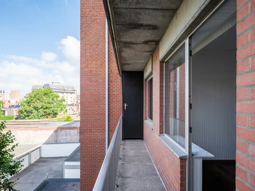 Op te frissen drieslaapkamerappartement met open zicht over het Citadelpark. foto 10