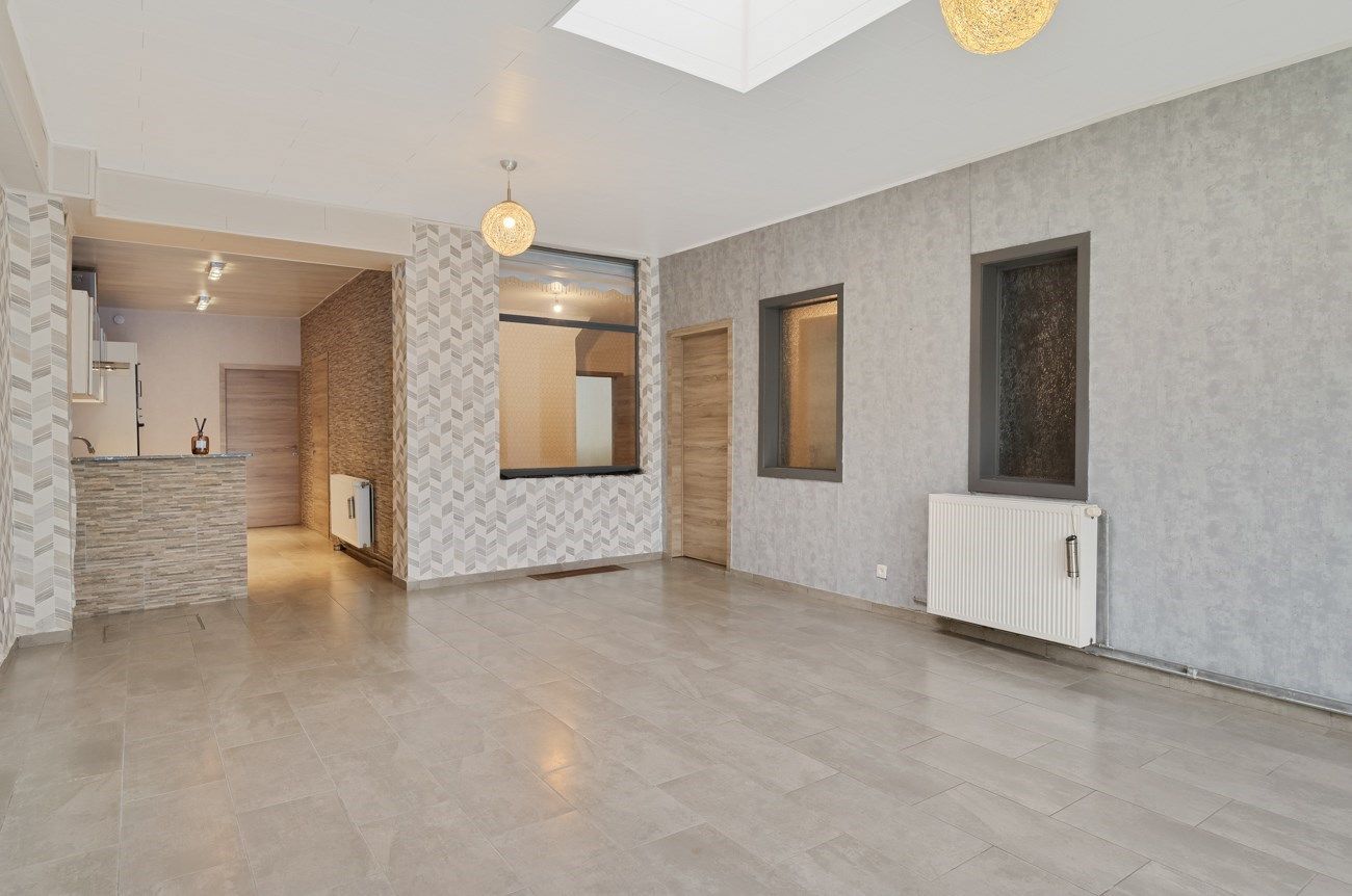 Ruime woning met tuintje en terras. foto 9